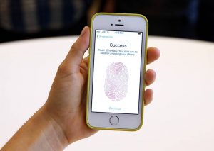Users can use their fingerprint to unlock an iPhone. (Justin Sullivan / Getty Images)